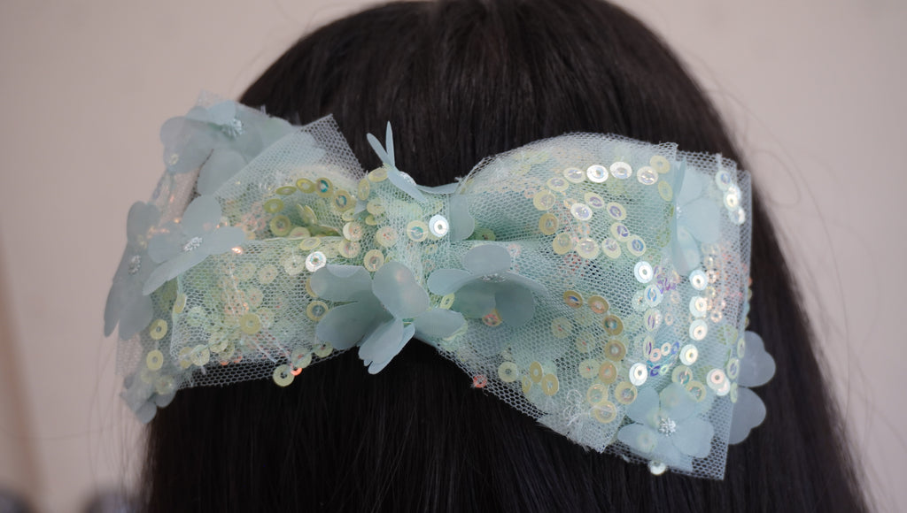 Sea green sparkle bow backclip