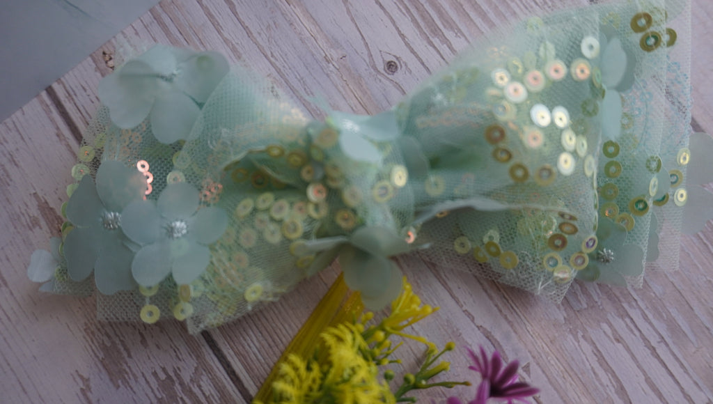 Sea green sparkle bow backclip