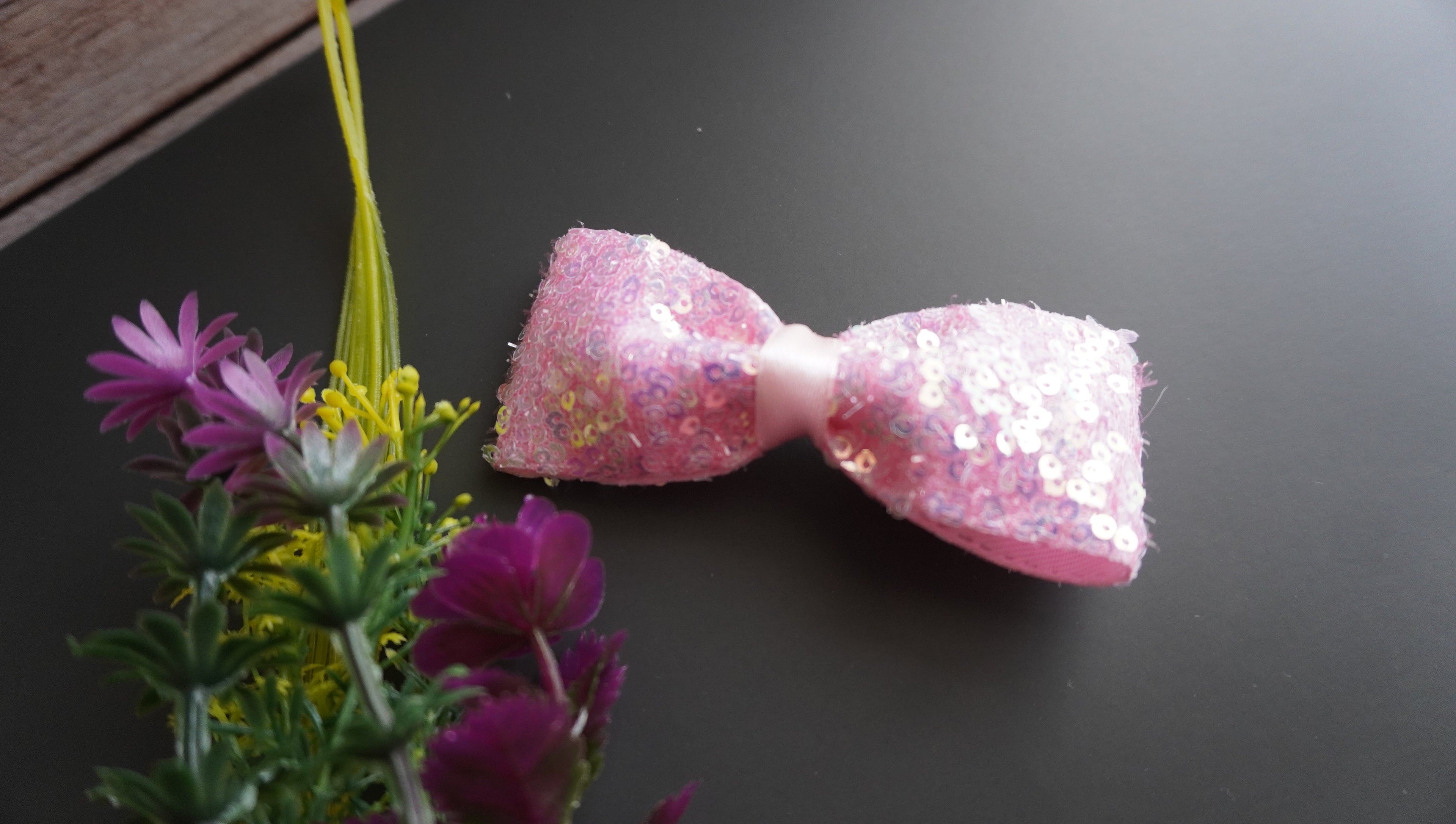 Pink sequence bow clip