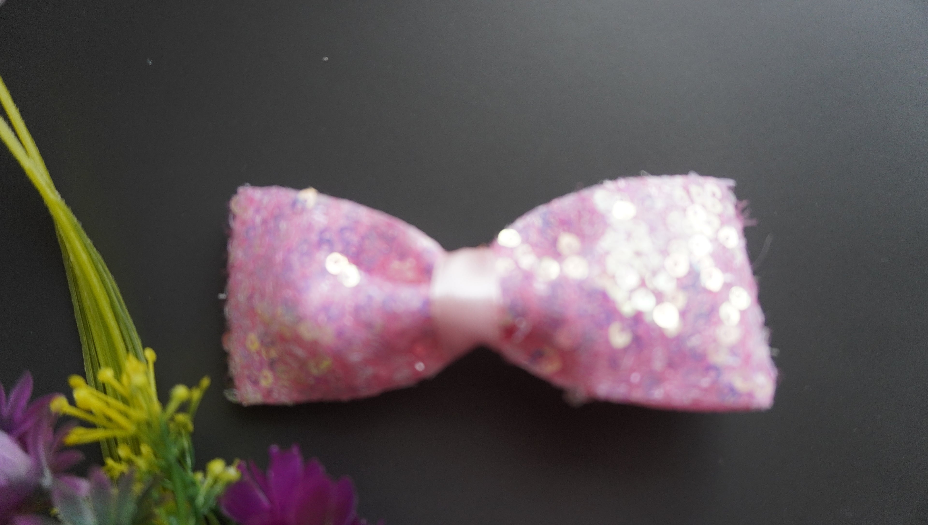 Pink sequence bow clip
