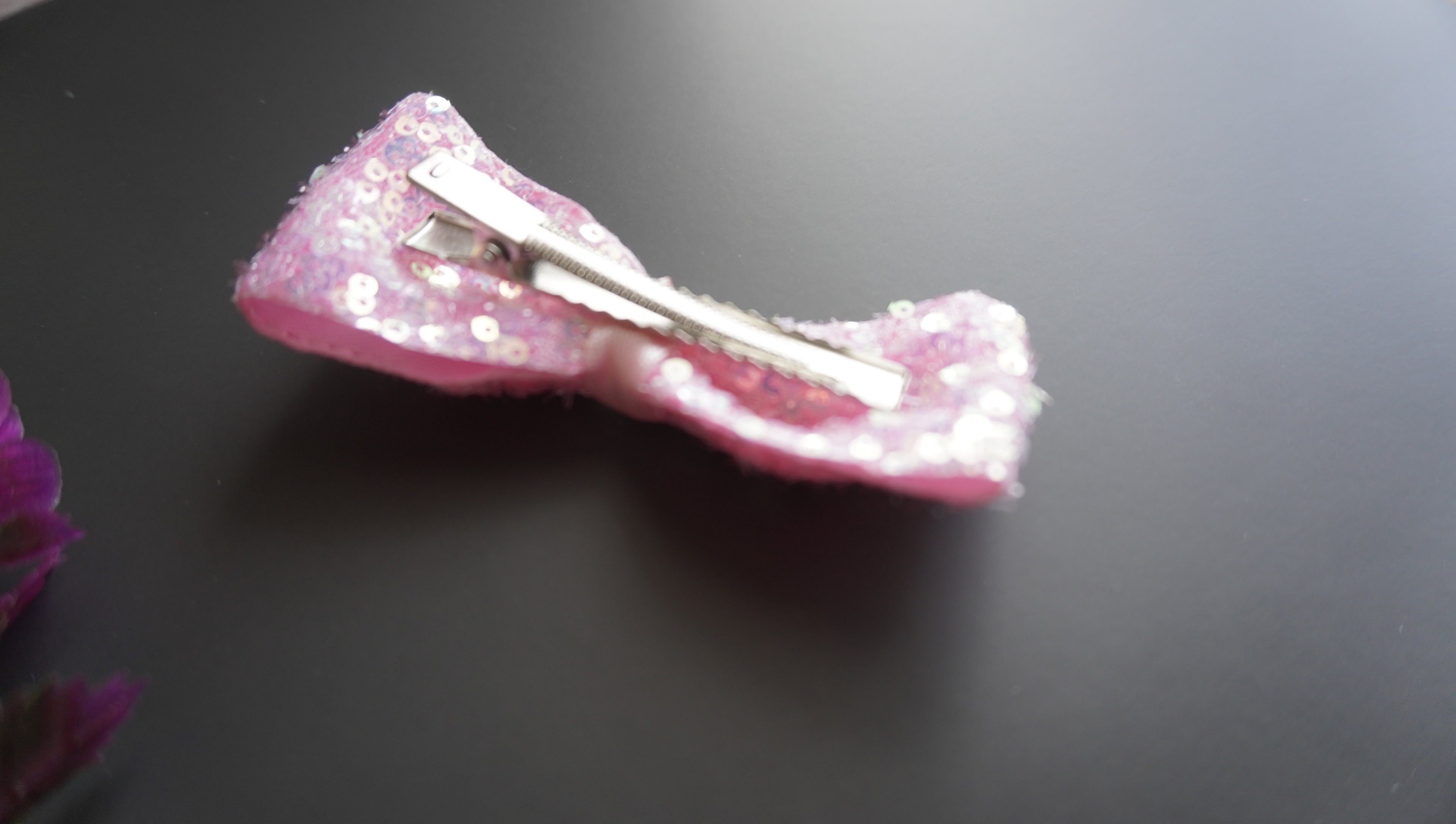 Pink sequence bow clip