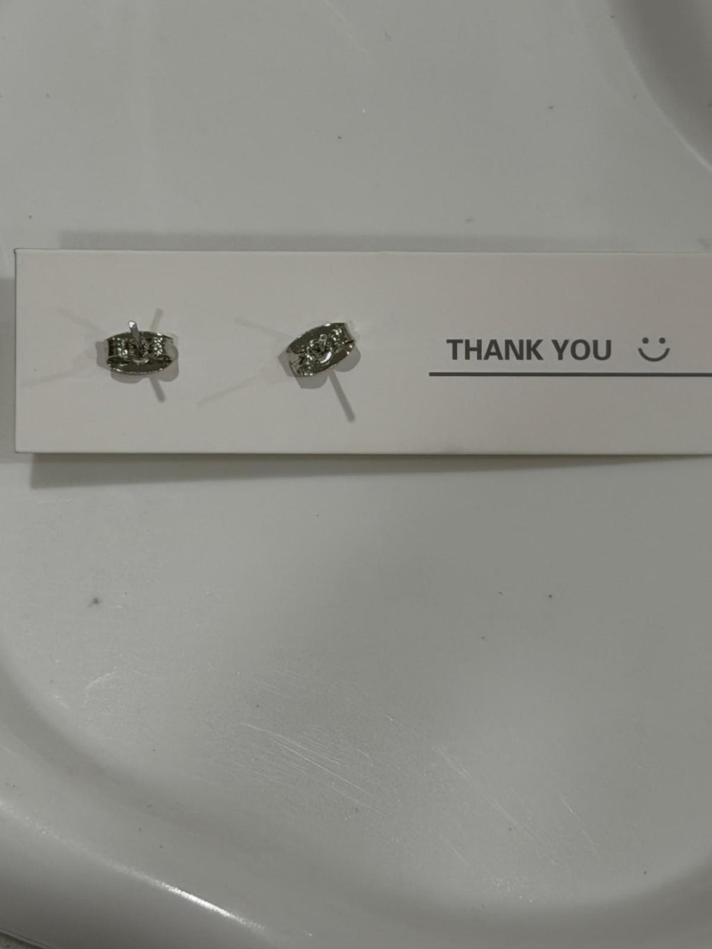 Resin ear tops